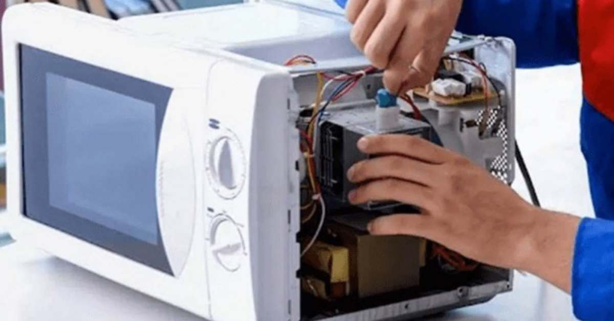 lò vi sóng bị rò điện